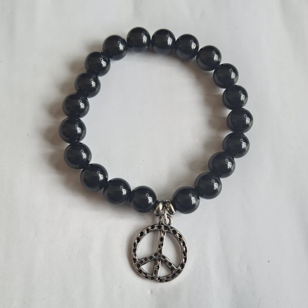Manilla con símbolo de paz