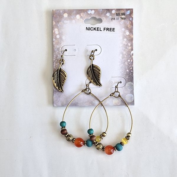 Set de aretes color bronce