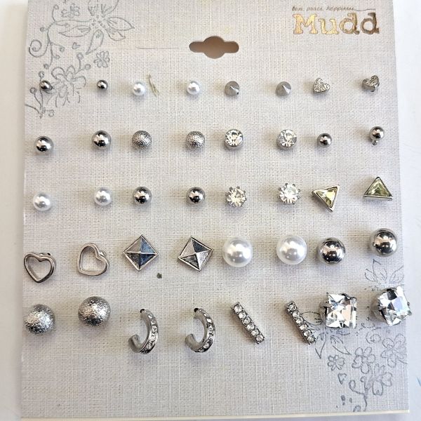 Set de aretes plateados varios diseños 